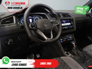 Volkswagen Tiguan SUV 1.4 TSI eHybrid R-Line (DEMO) Pano/ IQ-Light/ Head-Up/ Gancho de remolque eléctrico/ Portón eléctrico/ Control de crucero adaptativo/ Nácar/ Calefacción en los asientos/ Climatizador/ C